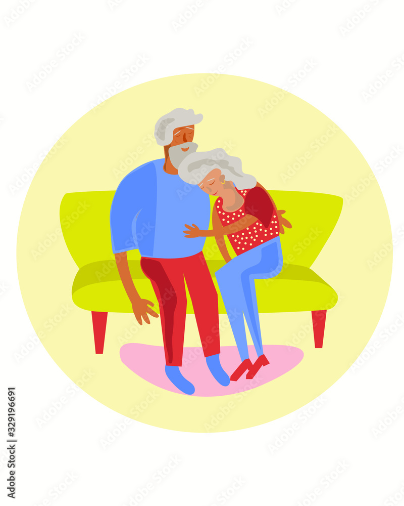 grandfather and grandmother are sitting on a yellow sofa grandfather and grandmother are sitting on a yellow sofa