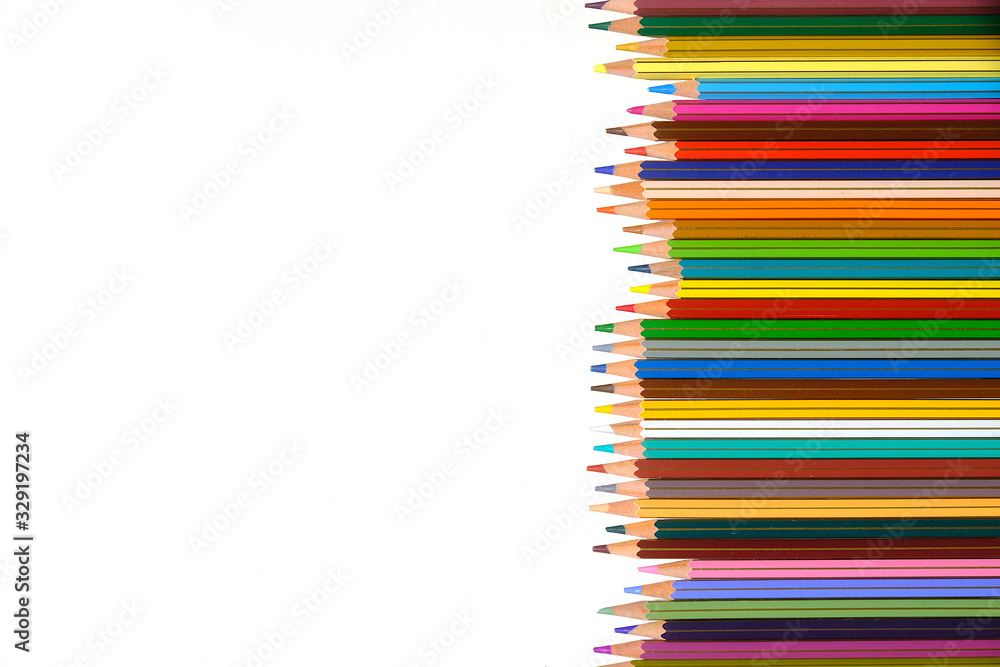 Crayons - colored pencil set arranged on white background Crayons - colored pencil set arranged on white background