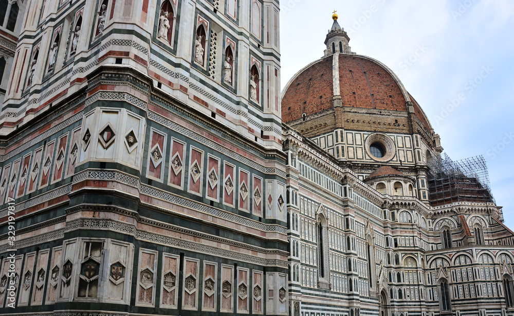 Basilica del Santa Maria del Fiore and the red-tiled dome .on Piazza del Duomo in Florence, Italy;.