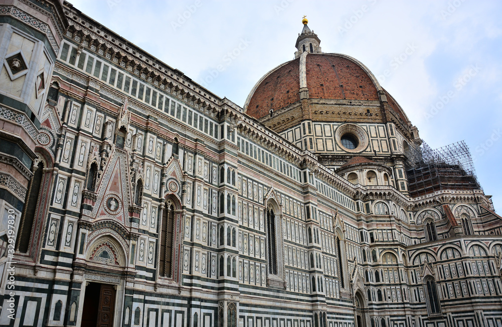 Basilica del Santa Maria del Fiore and the red-tiled dome  on Piazza del Duomo in Florence, Italy
