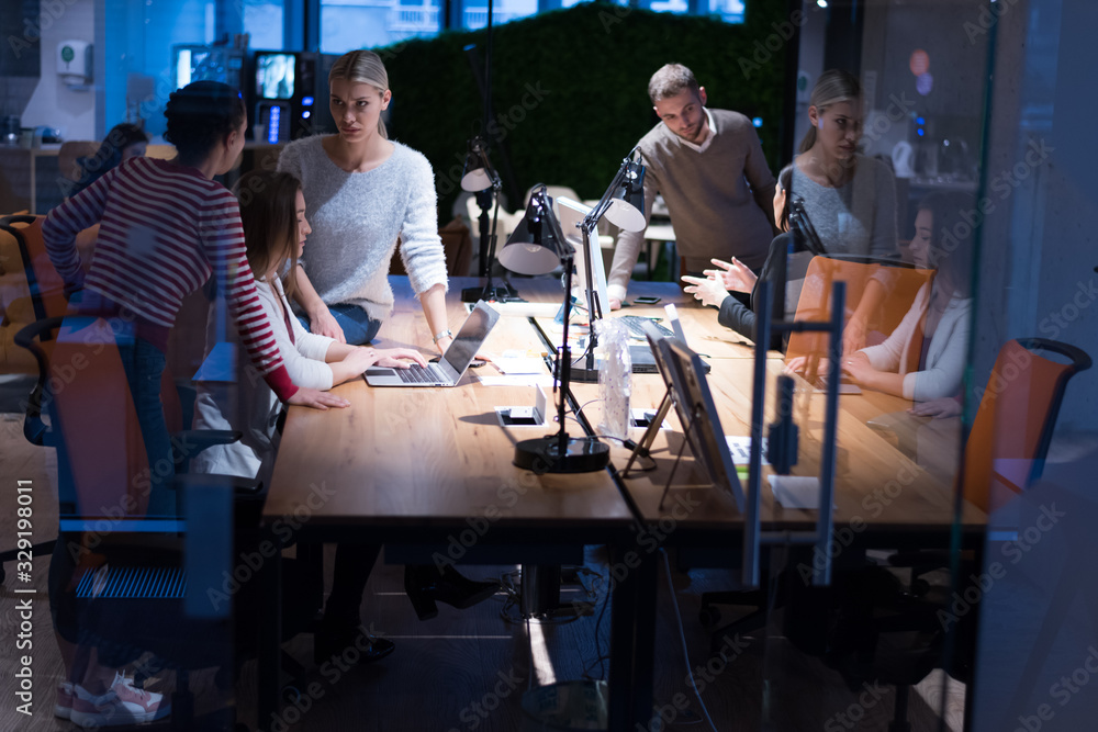 Meeting of co-workers and planning next steps of work. Young business group in discussion in their office. Startup people working in office. Meeting of co-workers and planning next steps of work. Young business group in discussion in their office. Startup people working in office.