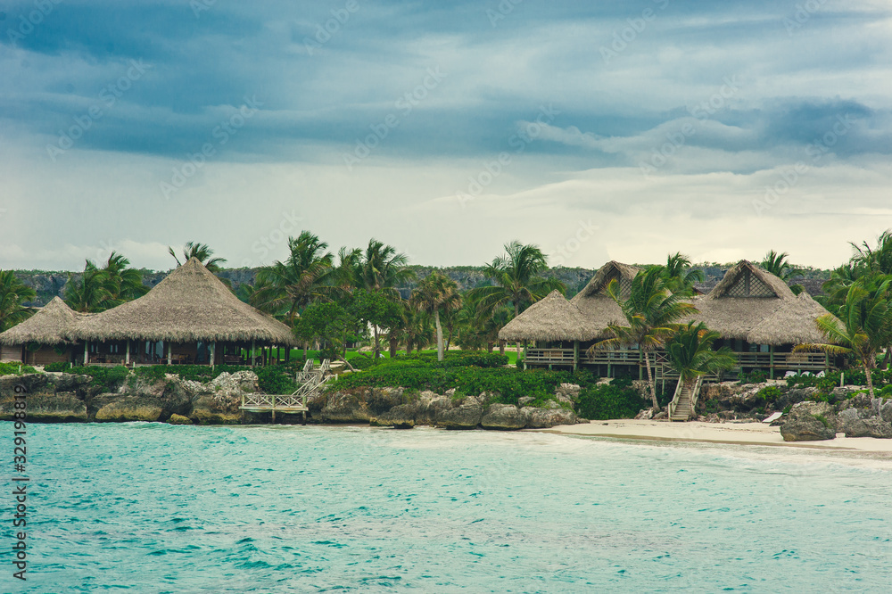 Fototapeta premium Water bungalows on a tropical island - travel background