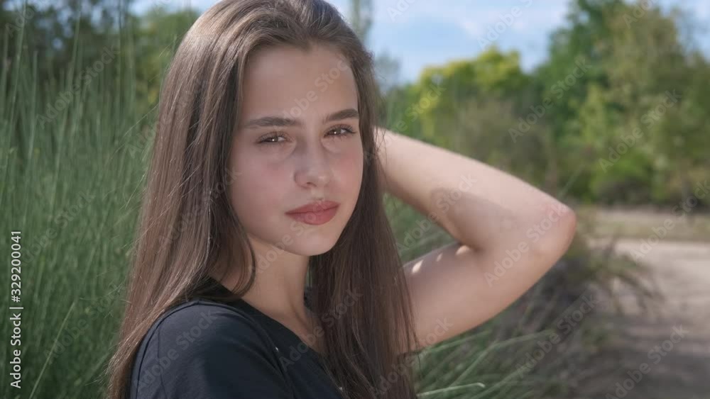Teen in the garden. Teen in the garden.