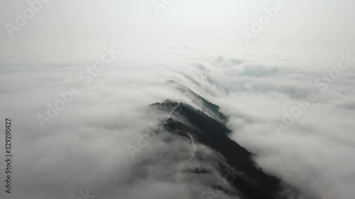 above the clouds and moutains drone aerial footage 3