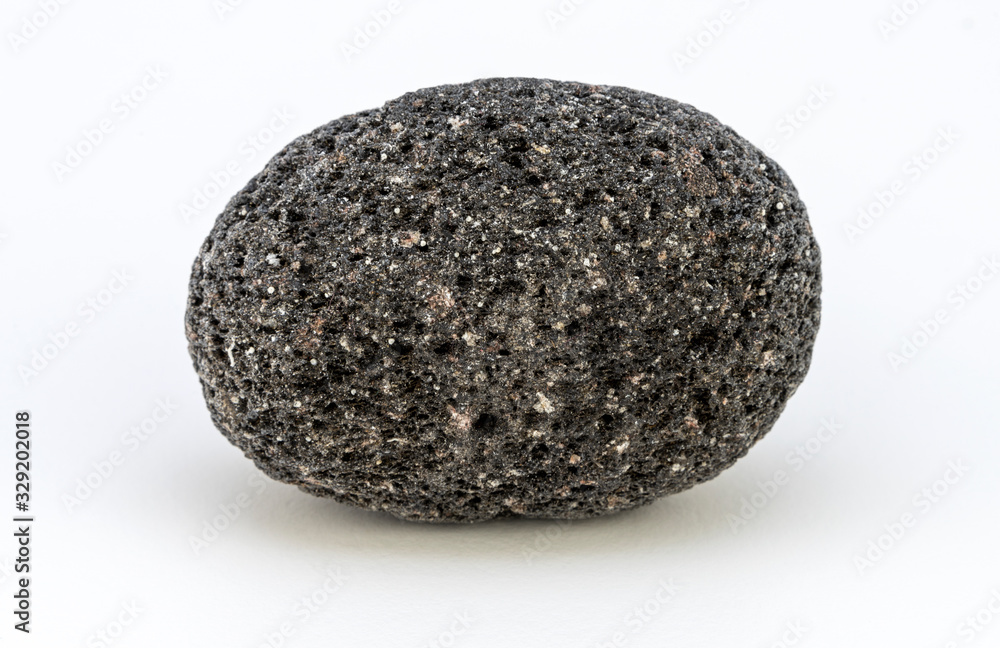 A pic of a perfectly oval shaped volcanic rock eroded by the sea A pic of a perfectly oval shaped volcanic rock eroded by the sea