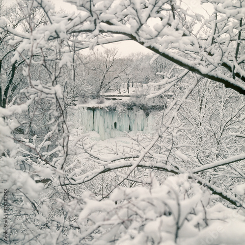 Frozen Minnehaha Falls surrounded by hoarfrost. Minneapolis Minnesota MN USA