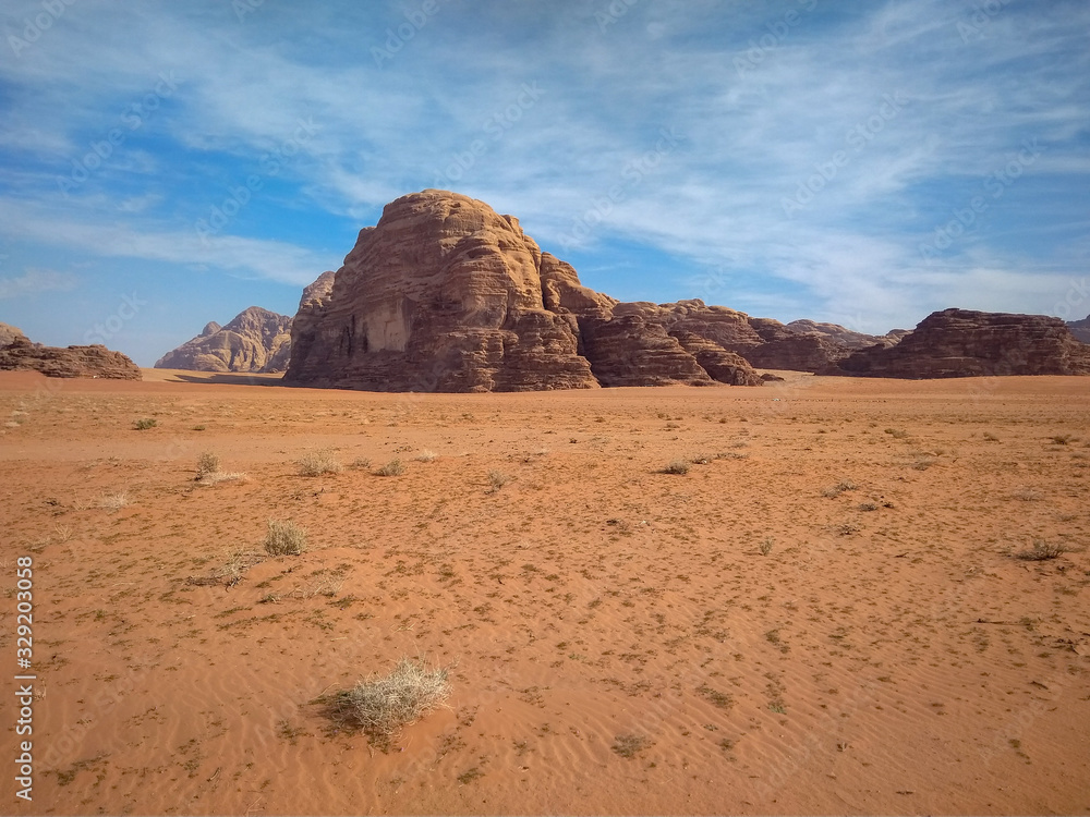 rock formations and desert landscape of Wadi Rum desert in southern Jordan. Popular tourist destination.