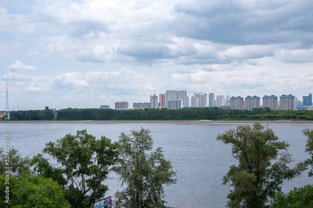 Russia, Blagoveshchensk, July 2019: the Amur River in Blagoveshchensk in the summer, on the other side of the Chinese city of Heihe