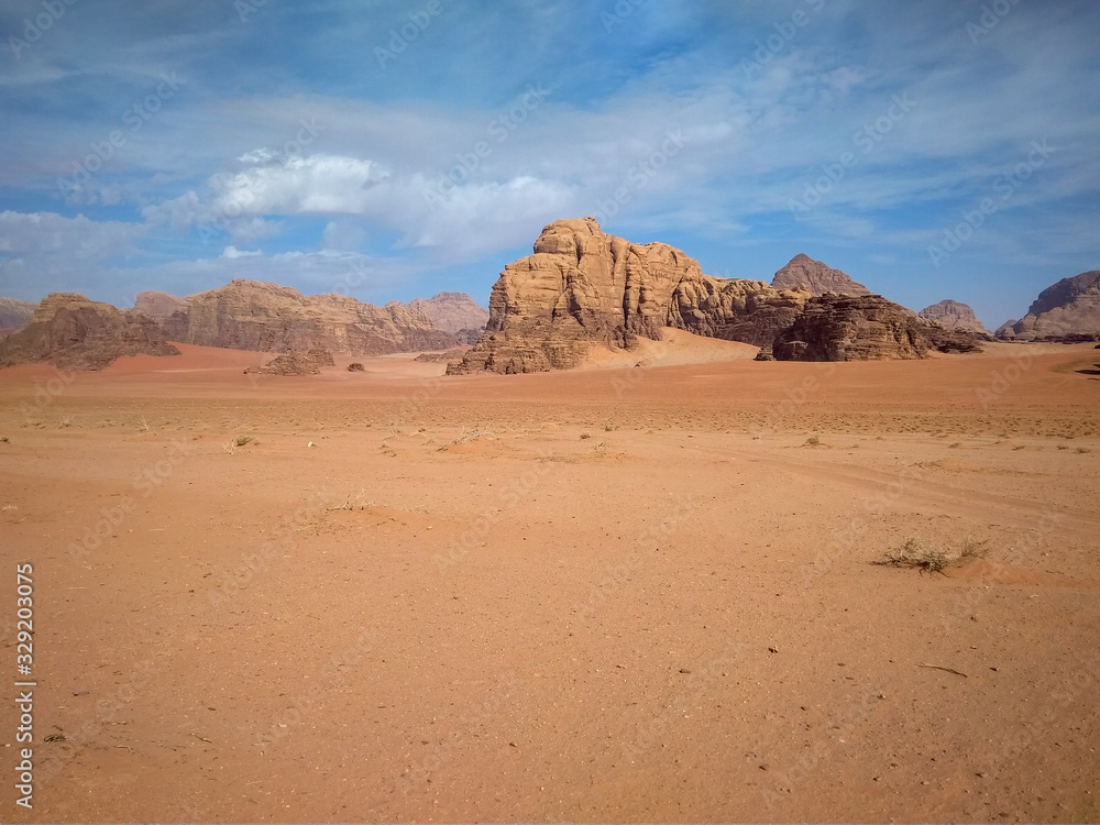 rock formations and desert landscape of Wadi Rum desert in southern Jordan. Popular tourist destination and place of Lawrence of Arabia rock formations and desert landscape of Wadi Rum desert in southern Jordan. Popular tourist destination and place of Lawrence of Arabia
