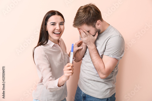 Emotional young couple with...
