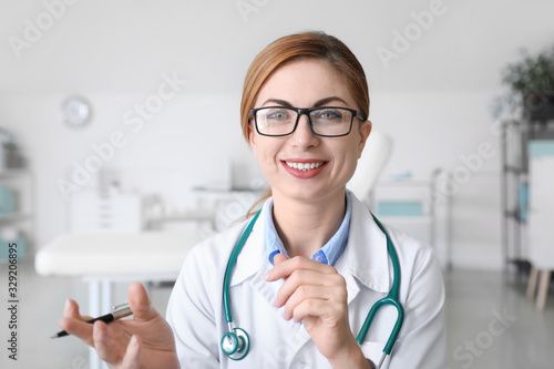 Female doctor using video c...