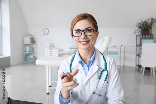 Female doctor using video c...