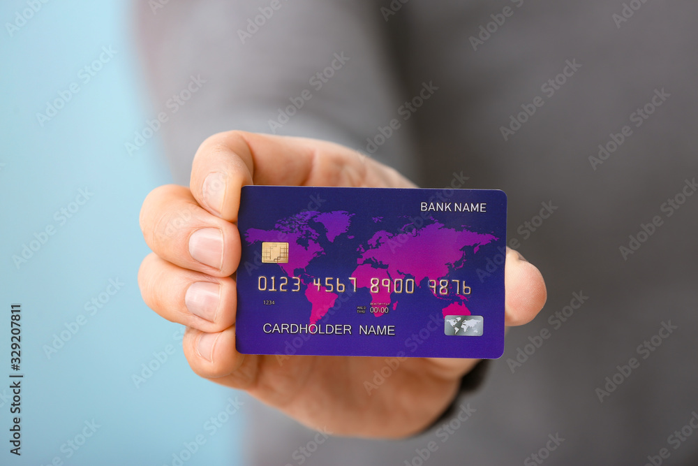 Man with credit card, closeup Man with credit card, closeup