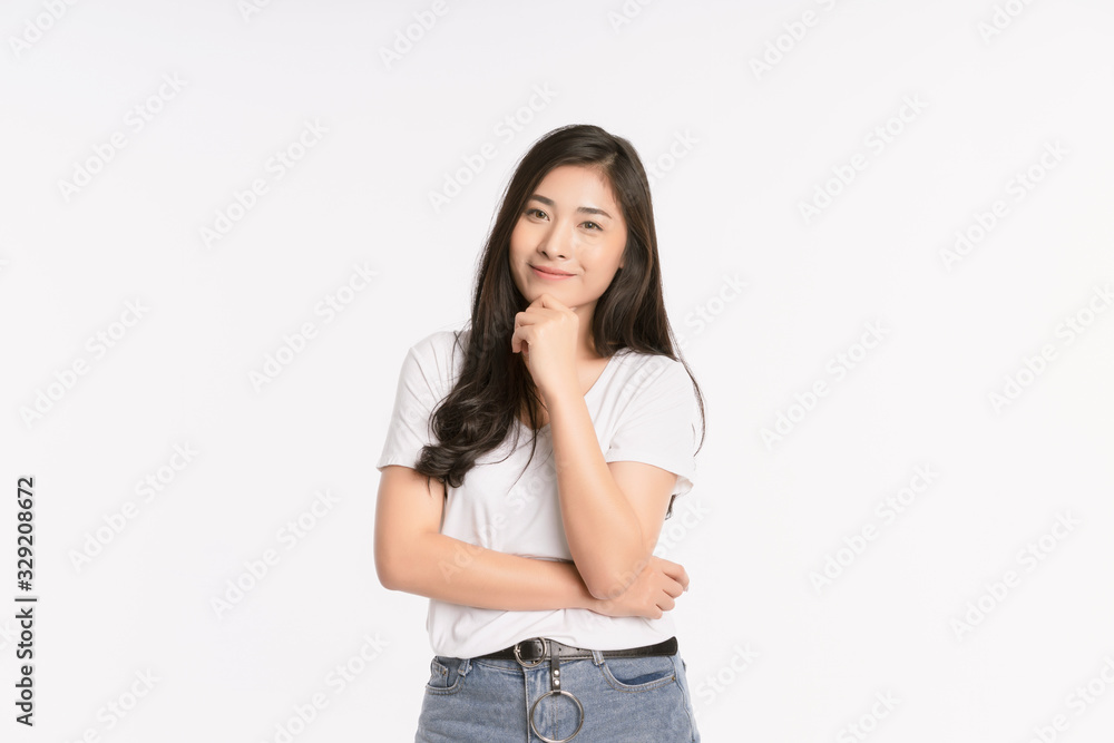 Young Asian girl Smiling, woman Portrait isolated on white background. The lady in a summer t-shirt Short jeans. Copy space Young Asian girl Smiling, woman Portrait isolated on white background. The lady in a summer t-shirt Short jeans. Copy space