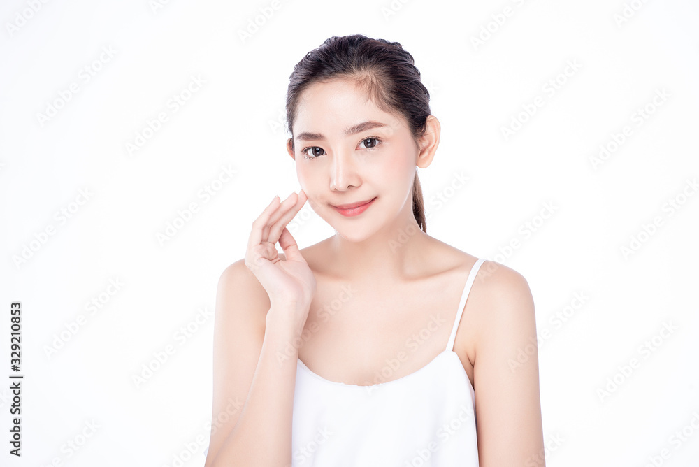 Asian woman poses for healthy skin beauty in white isolated background. Cosmetic, skincare, surgery concept with copy space. Her skin and face are healthy, beautiful, fresh and youthful. Asian woman poses for healthy skin beauty in white isolated background. Cosmetic, skincare, surgery concept with copy space. Her skin and face are healthy, beautiful, fresh and youthful.