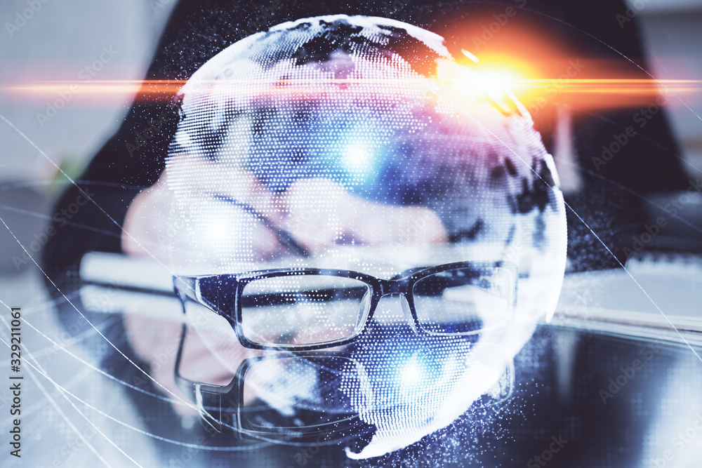 International business hologram over woman's hands taking notes background. Concept of success. Double exposure International business hologram over woman's hands taking notes background. Concept of success. Double exposure