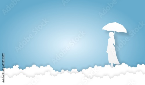 woman with umbrella in sky ...