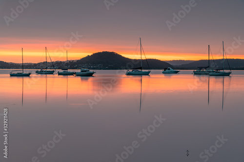 A Blanketed Sky, Boats and Reflections on the Bay © Merrillie