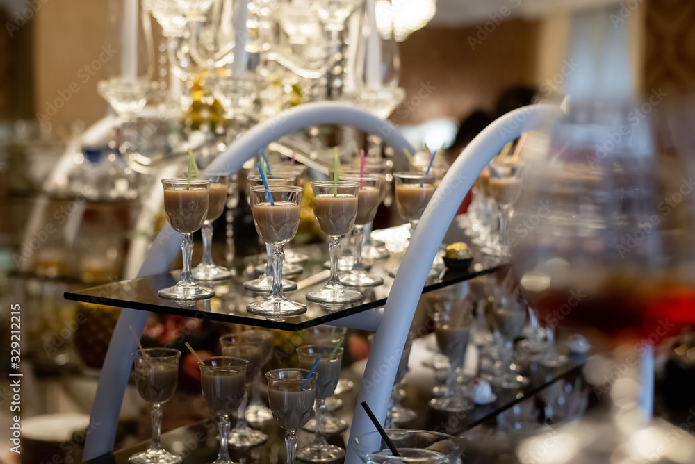 Horizontal images of different fresh alcoholic cocktail in glass on bar table, many drinks. Party and holiday celebration concept