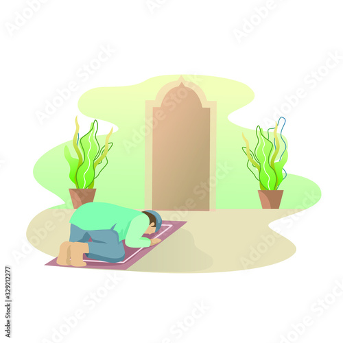 a man is doing the prostration for prayer on the prayer mat performing the commandments of ALLAH ta'ala