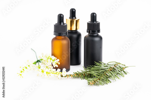 Fototapeta Naklejka Na Ścianę i Meble -  Natural  cosmetics concept: Cosmetics with grean leaves isolated on white