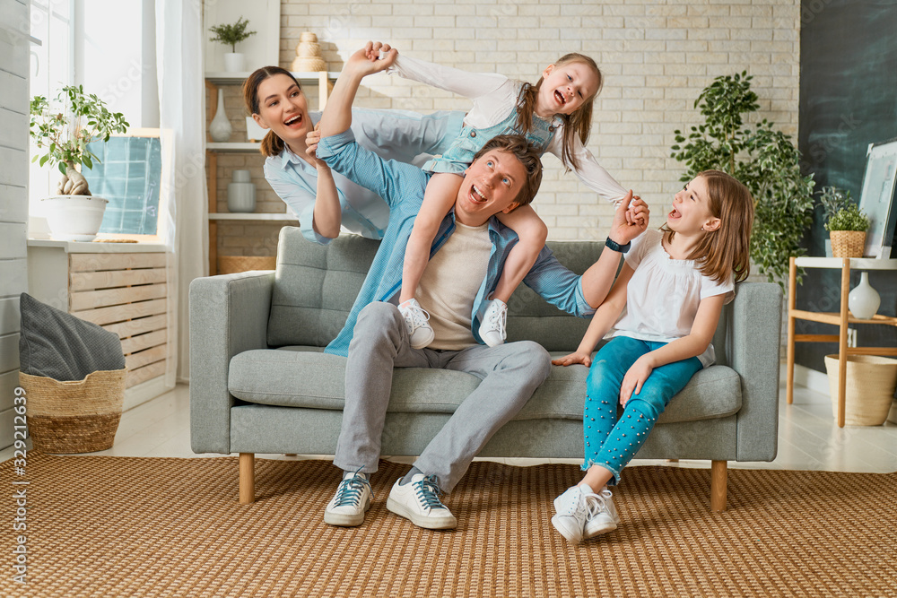 Two children with mother and father. Two children with mother and father.