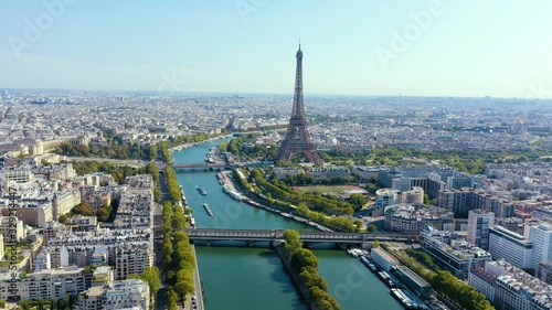 PARIS, FRANCE - MAY, 2019: Aerial drone view of Eiffel tower and Seine river in historical city centre from above. photo