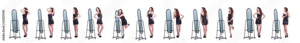 Woman trying new clothing on white Woman trying new clothing on white