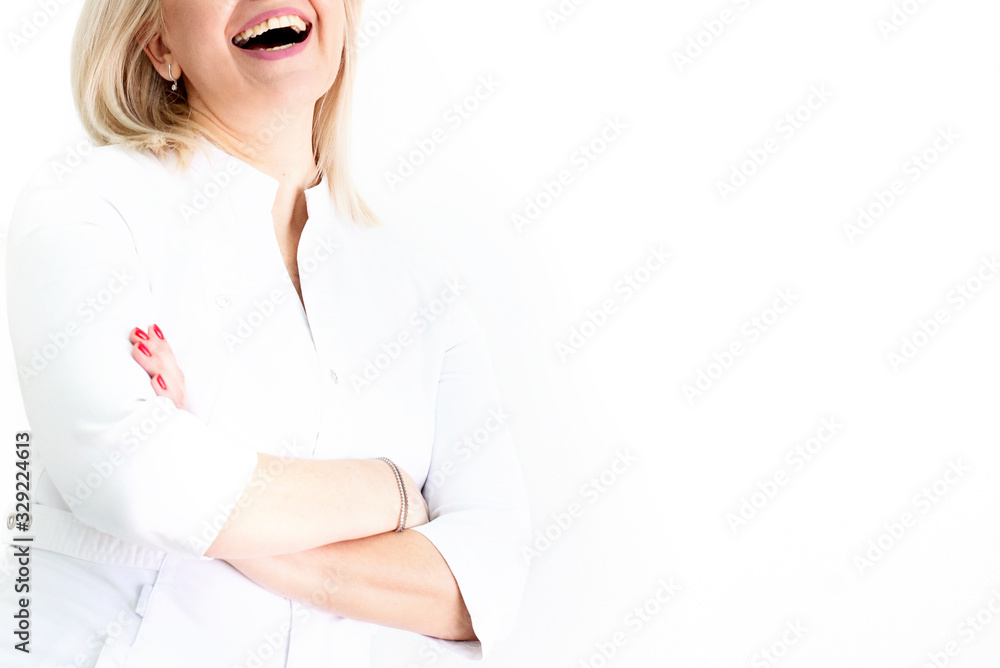 Smiling doctor in medical uniform. Cosmetology and medicine. Copy space. Isolated.