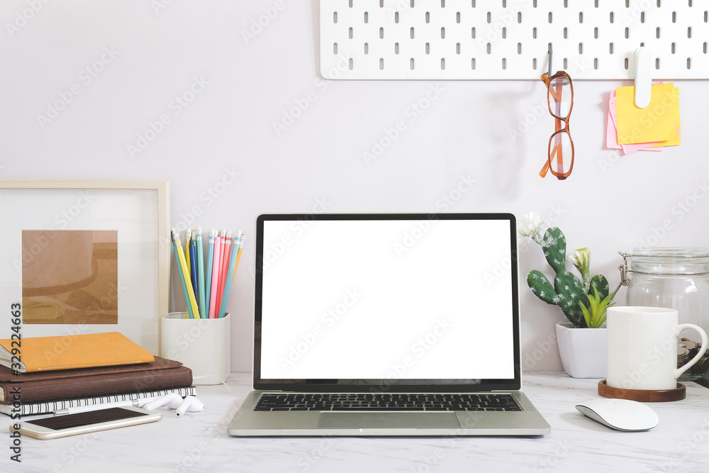 Fototapeta premium Workspace desk and laptop. copy space and blank screen. Business image, Blank screen laptop and supplies.
