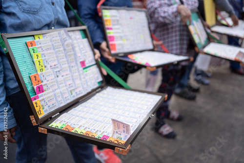 Street vendor selling Thai Lottery. photo
