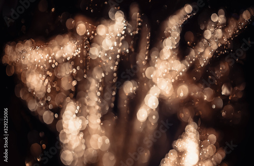 A close-up shot showing the surface of a golden glittering leaf. Use for back...