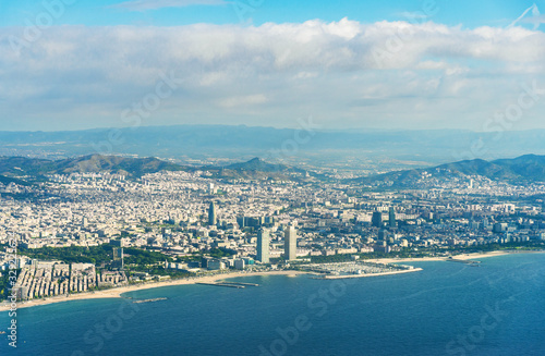 Panoramic aerial photography of Barcelona city, beaches, and sea