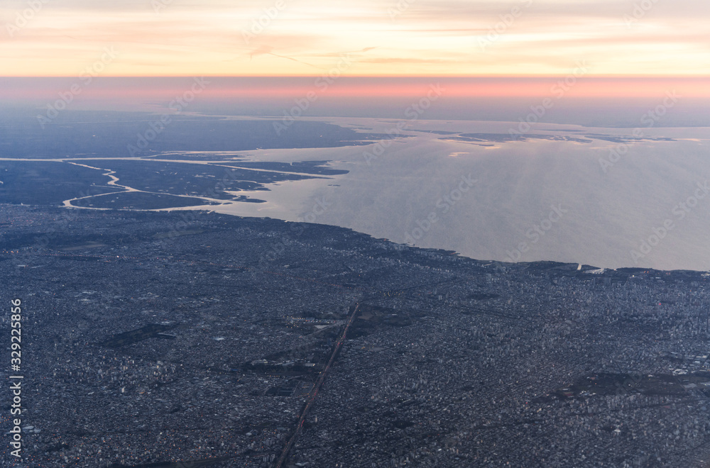 Fototapeta premium Landscape aerial sunrise view of Buenos Aires and River Plate, Argentina