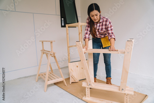 woman worker in the carpenter workroom.