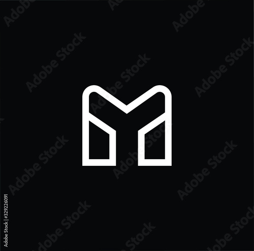 Minimal elegant monogram art logo. Outstanding professional trendy awesome artistic M MY YM initial based Alphabet icon logo. Premium Business logo White color on black background photo