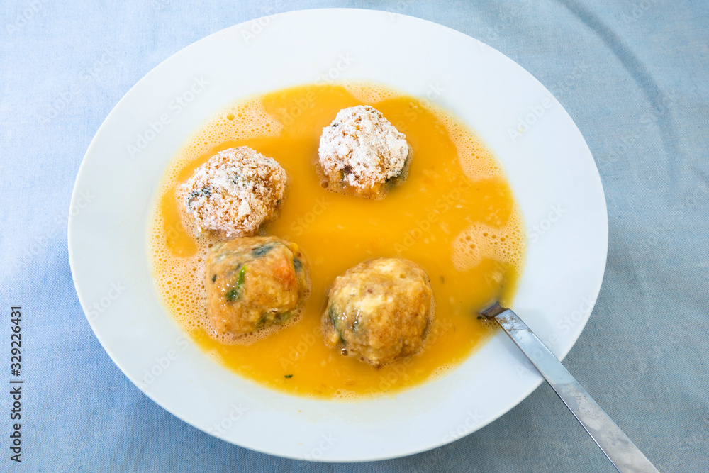 Roll the arancini ball inside the egg Roll the arancini ball inside the egg