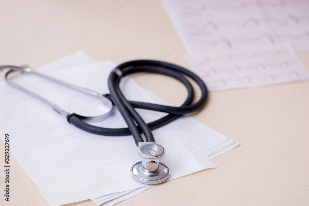 Young male doctor cardiologist working in the clinic Young male doctor cardiologist working in the clinic