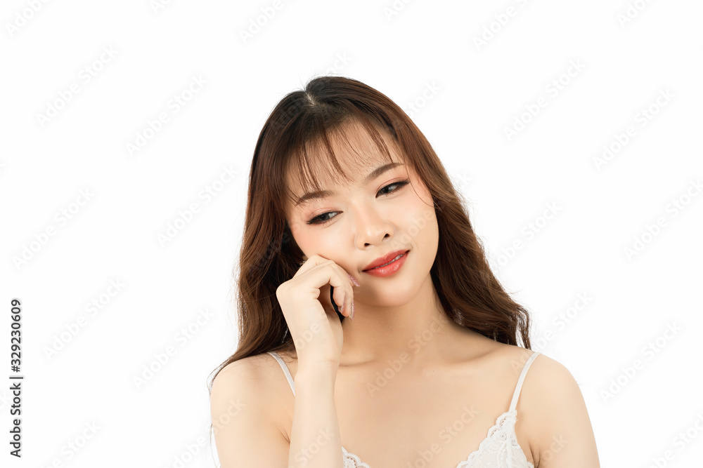 Portrait of attractive young woman with beauty skin and face isolated on white background. Healthy skin and face care concept. Portrait of attractive young woman with beauty skin and face isolated on white background. Healthy skin and face care concept.