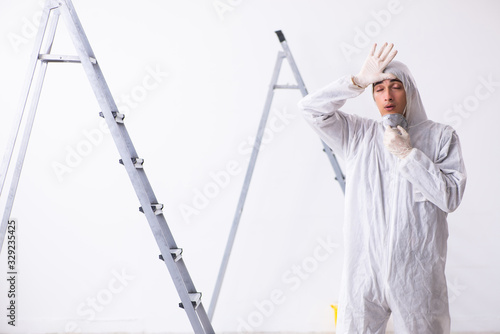 Painter working at construction site