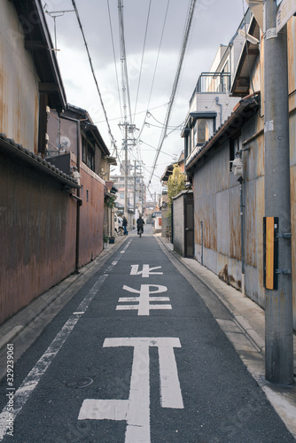 traditional small street in Gion with historical buildings