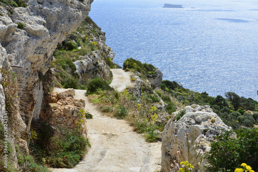 A narrow cliff path on the Dingli cliffs in Malta