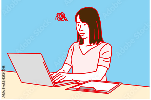 ノートパソコンで仕事をする女性