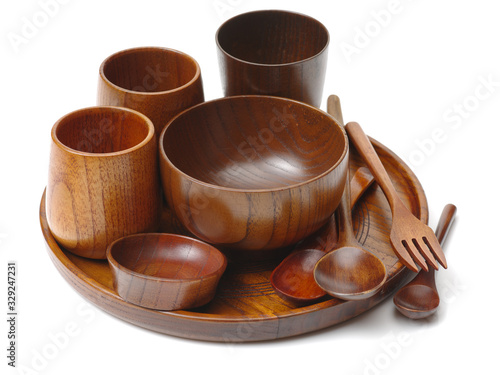 wood craft (cups, bowl, spoons, scoops) on white background