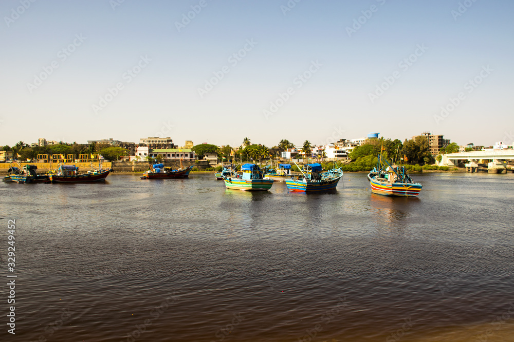 Fishing boats at Nani Daman Jetty in Daman, India