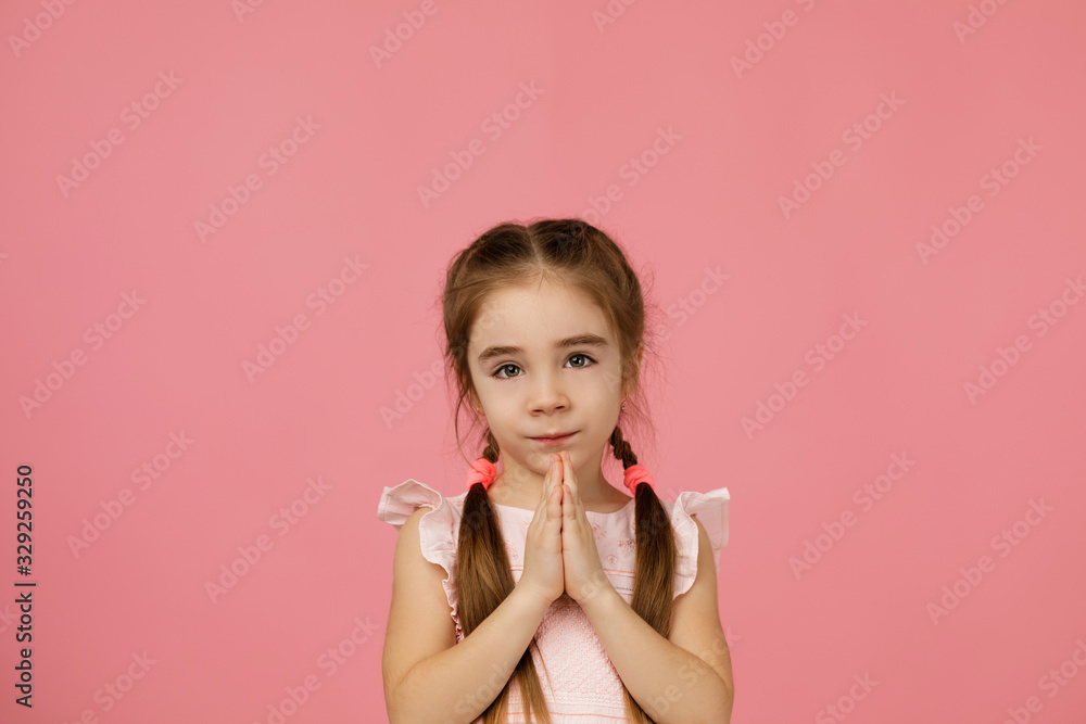 happy beautiful little girl asking for something. Dream come true. kid is praying happy beautiful little girl asking for something. Dream come true. kid is praying
