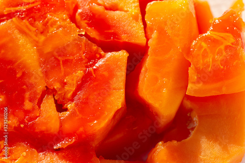 pieces of ripe papaya as background