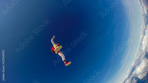 Looking. Extreme athletes conquer the sky. Height for skydiving. A sense of weightlessness and freedom