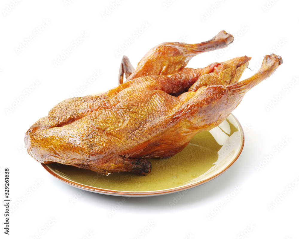 Peking Duck, China's most famous dish on white background Peking Duck, China's most famous dish on white background