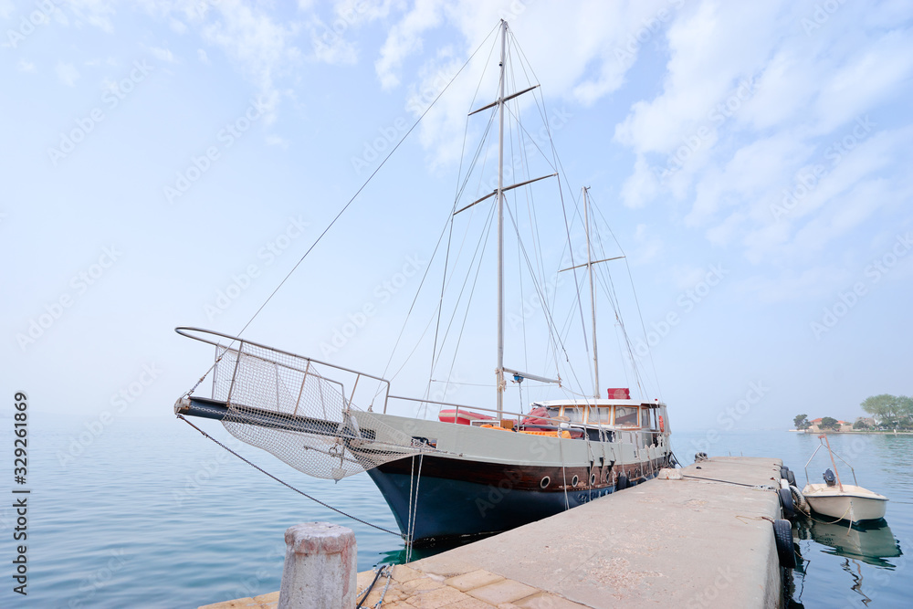 Big beautiful yacht at sea harbour.